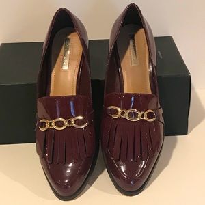Tahari women’s patent wine colored shoes.